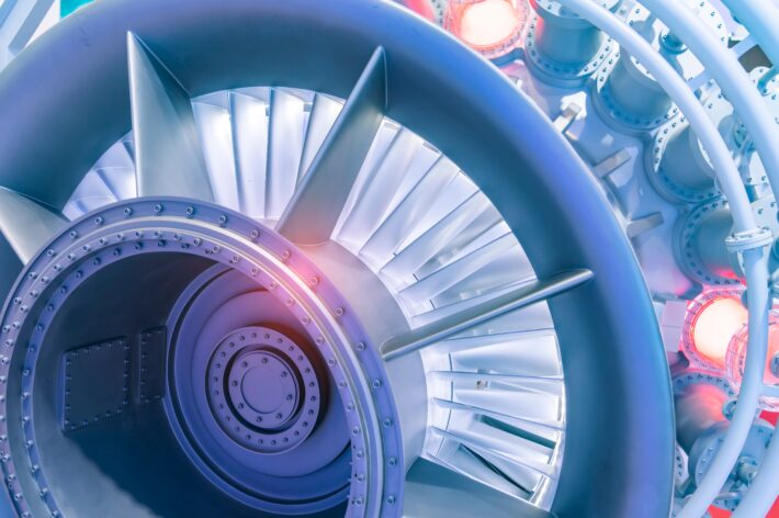 A closeup view of a jet engine and its internal structure, all of which are assessed during aerospace testing procedures.